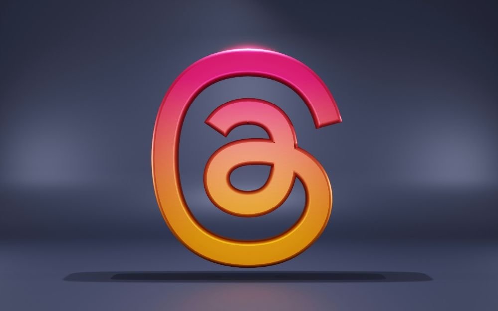Logotipo de la red social Threads usado como ejemplo de plataforma donde los atacantes recopilan información personal para ataques de phishing con IA.